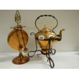 A Victorian brass kettle on stand and an early 20th century brass dinner gong.