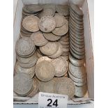 Approximately 1500 grams of British pre 1947 silver half crowns.