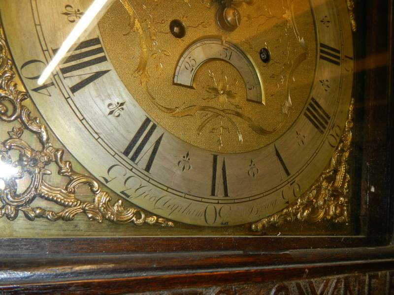 A heavily carved 8 day brass faced Grandfather clock by Geo. Raphams, Brigg. - Image 4 of 7