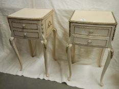 A pair of French style 2 drawer bedsides on cabriole legs.
