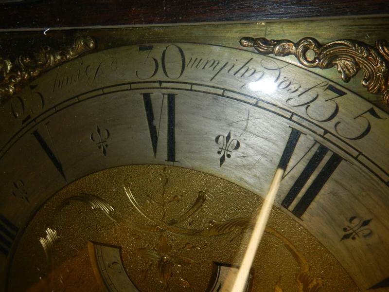 A heavily carved 8 day brass faced Grandfather clock by Geo. Raphams, Brigg. - Image 6 of 7
