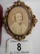 A Victorian double sided mourning brooch with photo to one side and hair memorial set seed pearls
