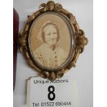 A Victorian double sided mourning brooch with photo to one side and hair memorial set seed pearls