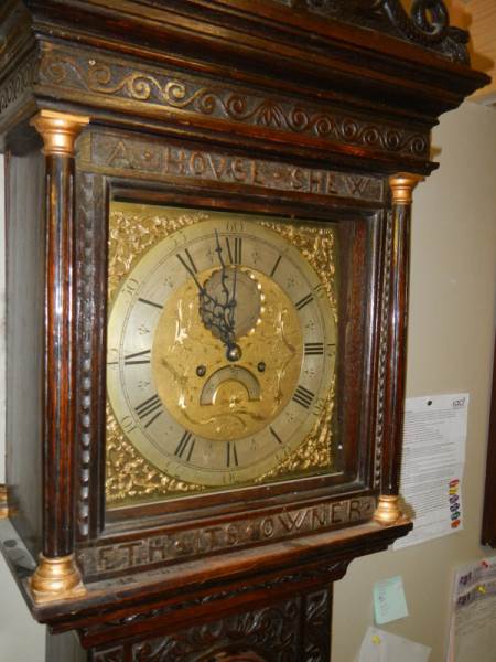 A heavily carved 8 day brass faced Grandfather clock by Geo. Raphams, Brigg. - Image 3 of 7