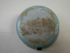 A hand painted trinket pot/pin dish, in fair condition.