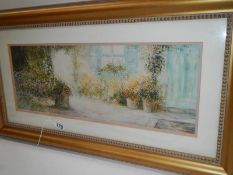 A mid 20th century gilt framed and glazed watercolour of a garden, signed Scoir's,