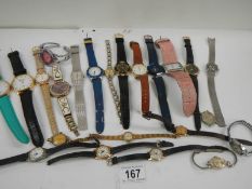 A mixed lot of ladies and Gent's wrist watches, (approximately 23).