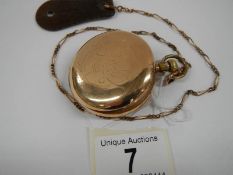 An Elgin full hunter pocket watch on chain marked Keystone watch case 7632118.