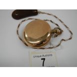 An Elgin full hunter pocket watch on chain marked Keystone watch case 7632118.