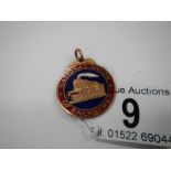 A 9ct gold 'National Union of Railway men' fob,