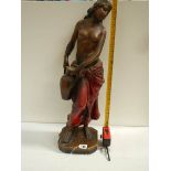 A tall plaster figure with original paintwork, 26" tall and in good condition.