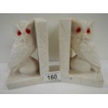 A pair of alabaster owl bookends.