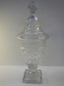 A mid 20th century cut glass lidded jar, approximately 15" tall, in good condition.