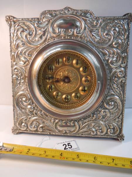 A good quality embossed silver plated mantel clock in good working order (8" wide x 8" high). - Image 4 of 4