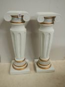 A pair of matching pillars, 25.5" tall, in good condition.