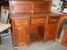 An arts and craft sideboard in good clean condition for age.