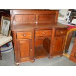 An arts and craft sideboard in good clean condition for age.