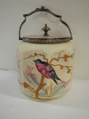 A late Victorian biscuit barrel hand painted with birds and with plated lid and handle.