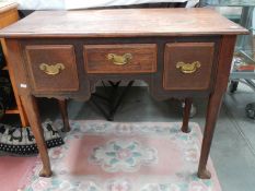 A Victorian oak 3 drawer lowboy.