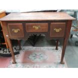 A Victorian oak 3 drawer lowboy.