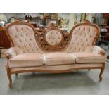 A super triple back mahogany framed sofa, frame in good condition,