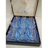 A boxed set of 6 Cumbria crystal wine glasses, 5" tall.