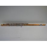 A Besson flute in good playing order.