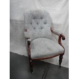 A Victorian mahogany arm chair, upholstery in good condition for age.