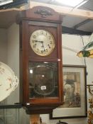 An oak wall clock