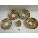 A set of 4 Chinese bronze tray holders and a pill box with slate insert (signed)