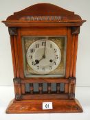 An early 20th century mantel clock in working order (spring ok and complete).