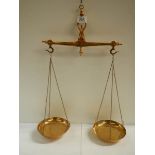 A set of solid brass balance scales