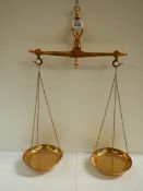 A set of solid brass balance scales