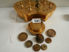 A collection of various brass weights