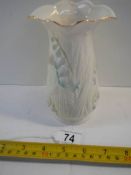 An original Belleek vase, 6.5" tall, in good condition.