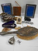 A mixed lot of interesting items including silver rattle, brush etc.