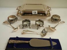 A silver plate tureen, 2 pairs of salts and a silver handles cake slice.