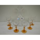 A Royal Doulton crystal decanter and a set of 6 deco glasses with amber glass stems.