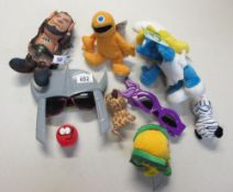 A collection of small premium toys and plsuh including Teenage Mutant Ninja Turtles, Warcraft,