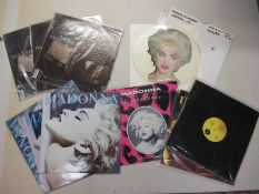 10 Madonna records and LPs including 3 variants of Like a Virgin LP, 3 variants of True Blue album,