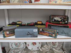 A quantity of boxed Die cast including Corgi and Atlas Stobart lorries, Burago etc.