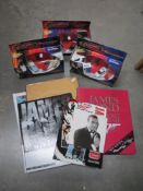 A quantity of James Bond books & 3 x 007 Die cast cars