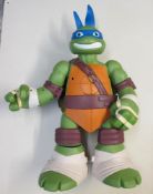 A large Teenage Ninja Turtle figure that opens up into a Ninja facility 24 inches high (62cm)