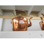 A Victorian copper kettle with acorn knob to lid.