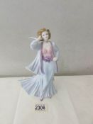 A Royal Worcester figurine - Thoughtful, 1996.
