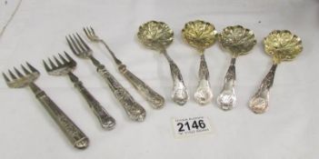 3 silver handled forks, one other and 4 silver plate ladles.