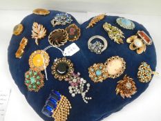 21 brooches