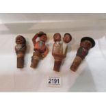 4 vintage novelty bottle stoppers.