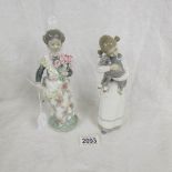 2 Lladro figures.