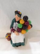 An Early Royal Doulton figurine 'The Old Balloon Seller', HN1315.